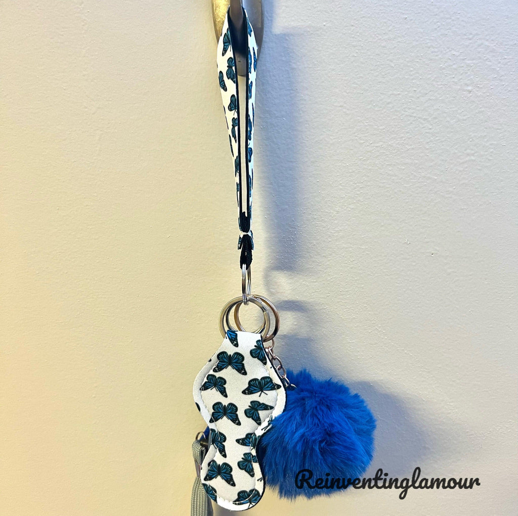 https://www.reinventinglamour.com/cdn/shop/products/blue-butterfly-safety-keychain-reinventing-glamour-1_1024x1024.jpg?v=1671114544